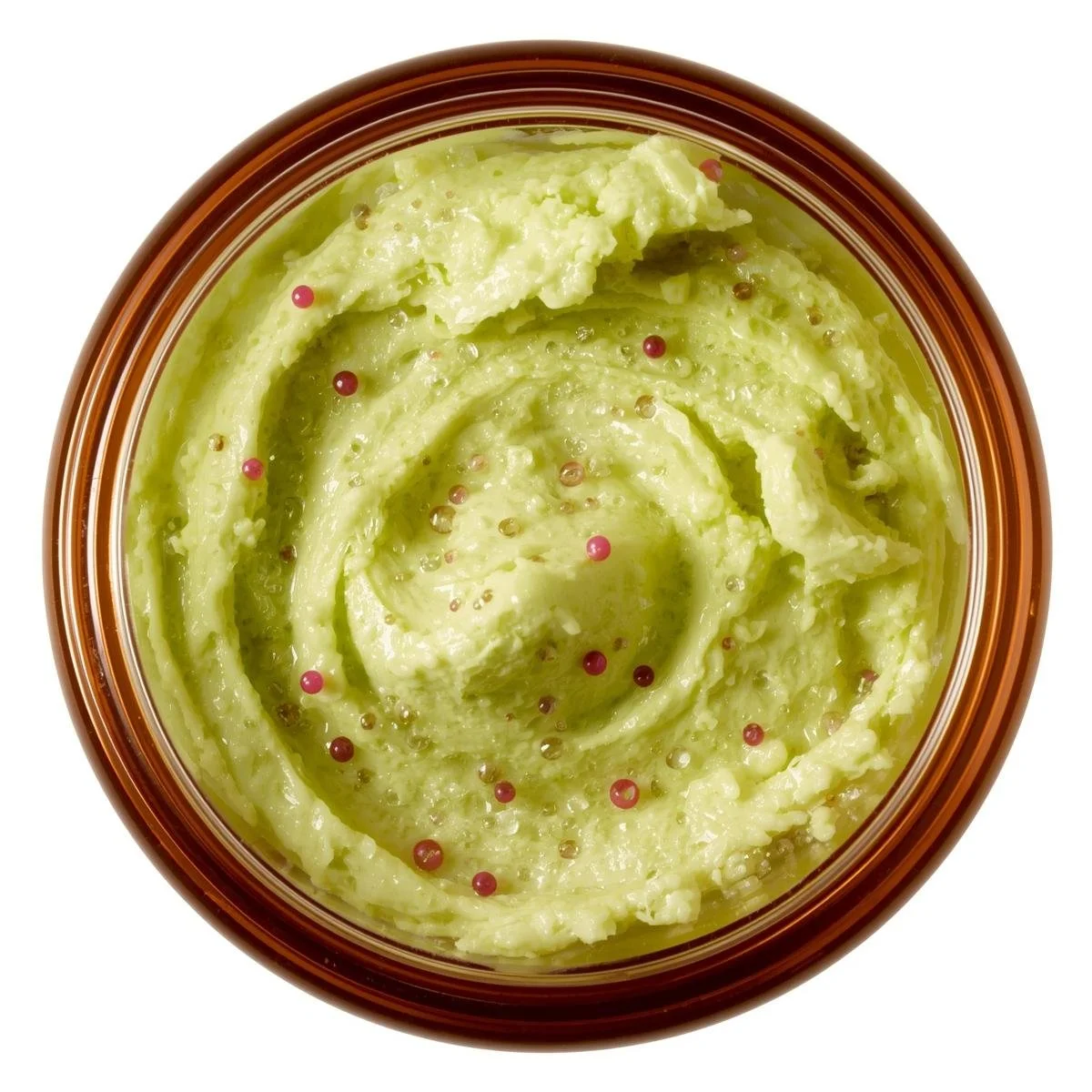 A top-down, slightly angled side view of an 8oz amber, straight-sided round PET plastic jar, filled withmfluffy lime green whipped soap. Tiny, vibrant fuchsia jojoba beads are suspended within the soap, cre.jpg