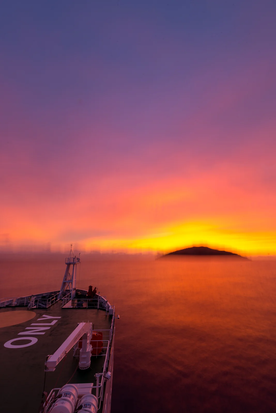 Long exposure of Macauley Island in sunrise.