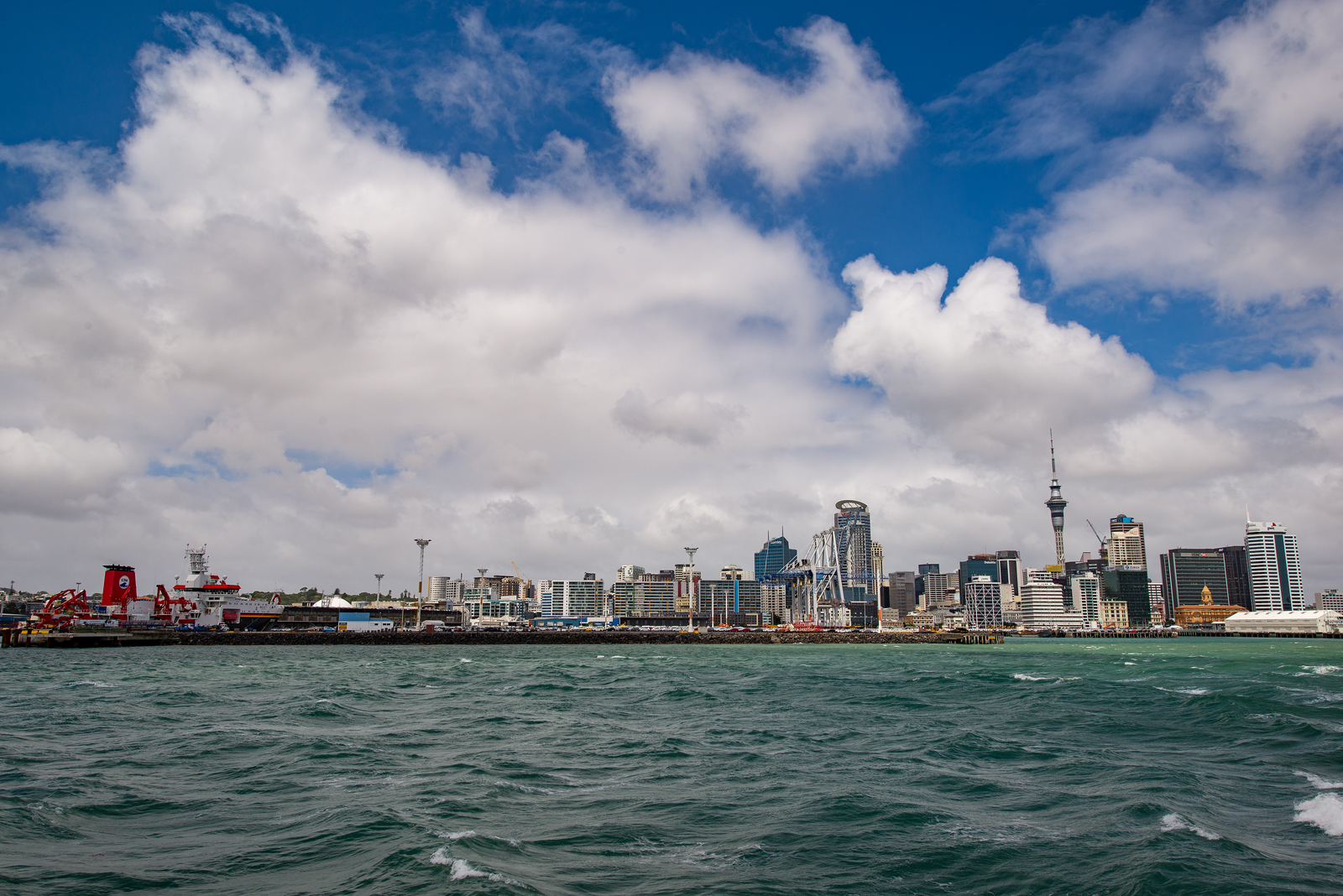 The skyline of Auckland with RV Sonne in the foreground as seen from the Rangitoto ferry.