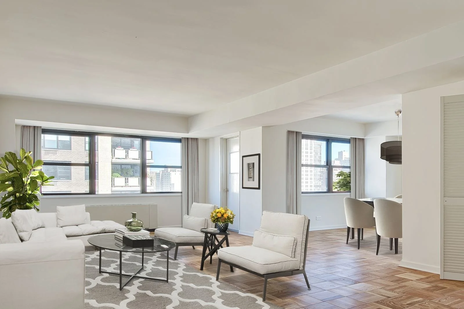 Living room with two windows, parquet floor and a dining corner (virtually staged)