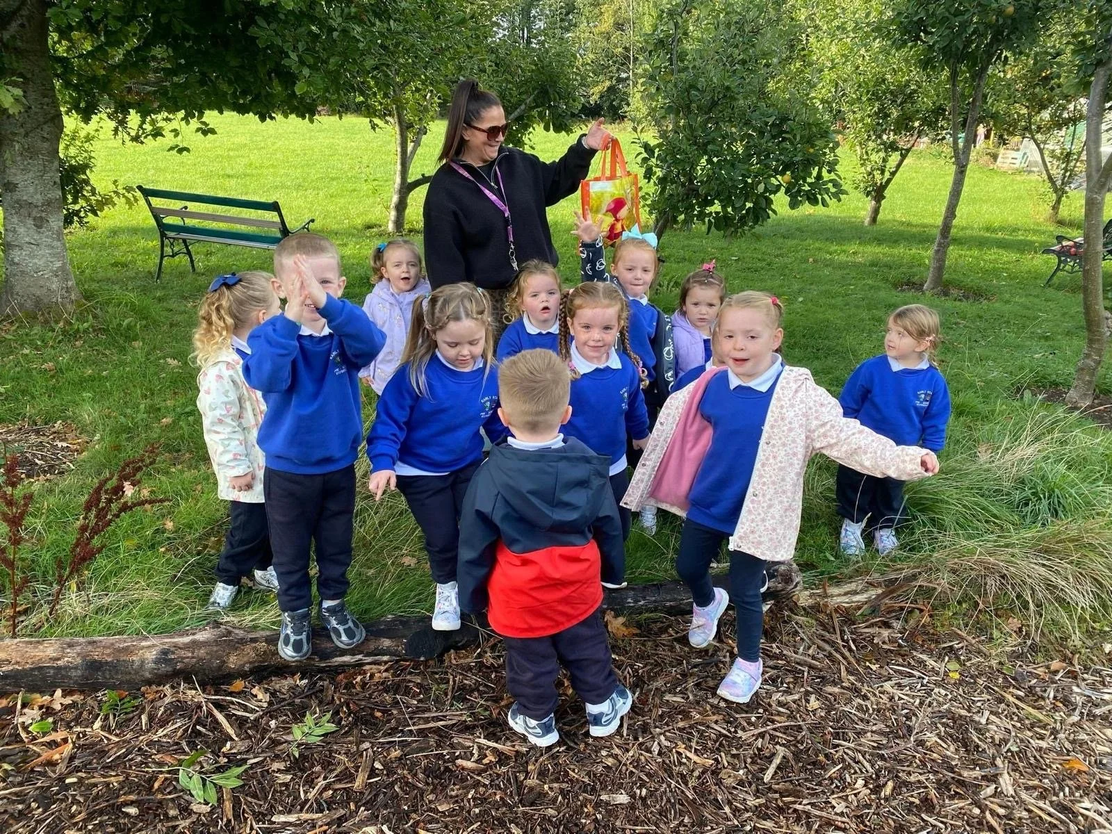 Early Start picking apples in the school garden.JPG