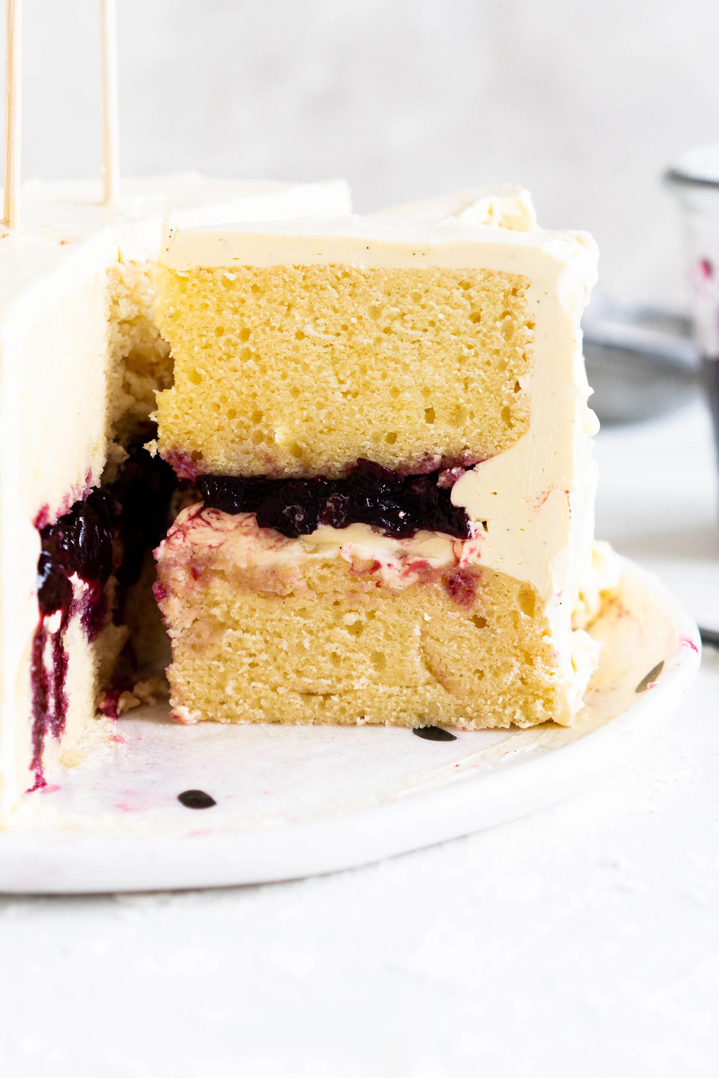 Two Layer Vanilla Bean Buttermilk Cake with Cherry Compote and Vanilla