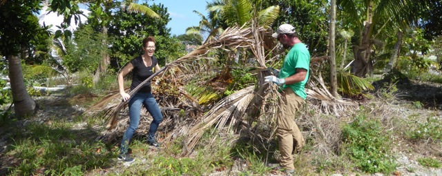 NAGB director, Amanda Coulson and Dr. Freid clearing the garden space. 