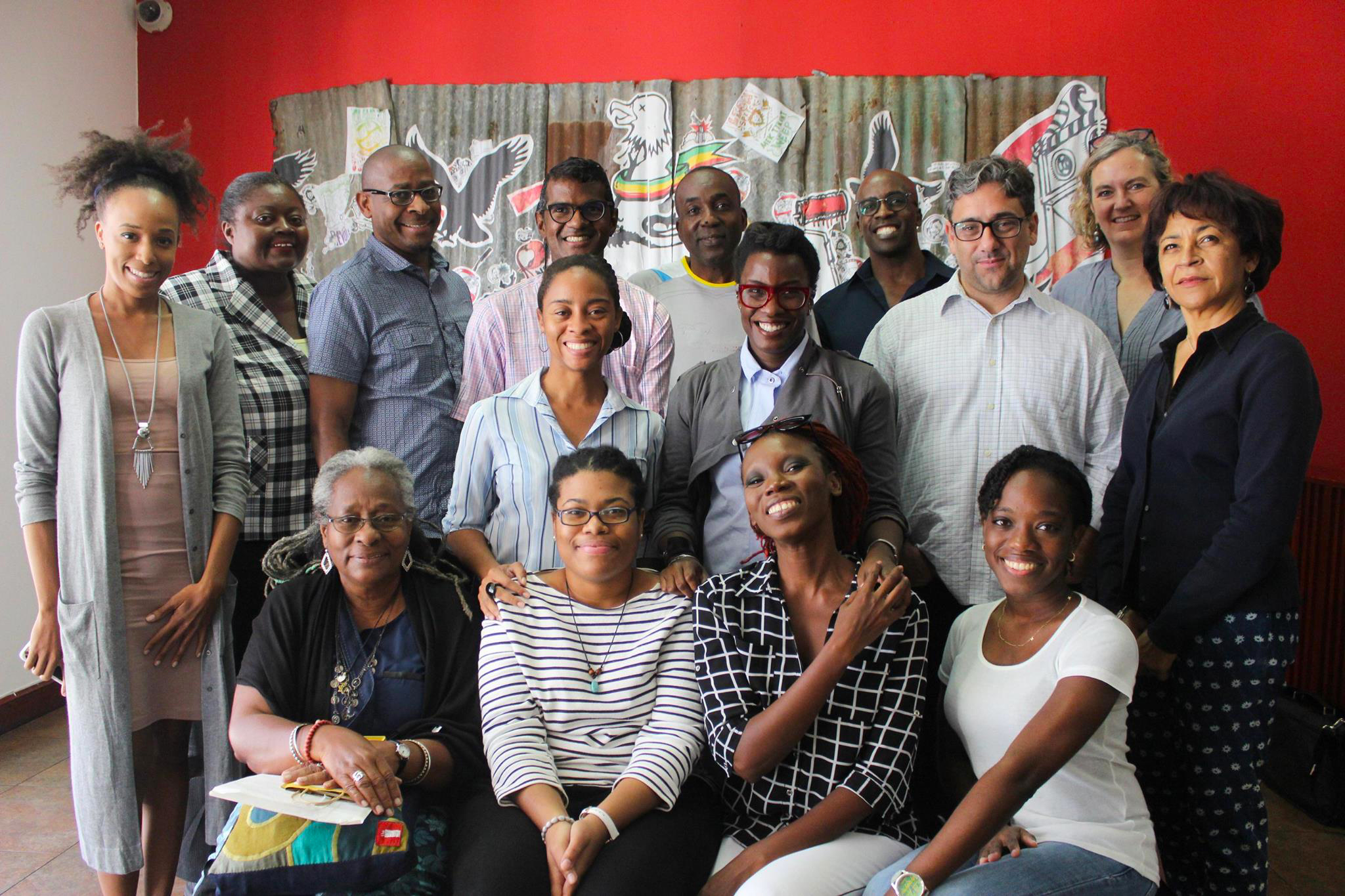 Creative Journalism Workshop partners, facilitators, and participants visit the National Gallery of Jamaica on Tuesday, January 10th. From Left (Back): Keisha Oliver, Joan Francis, Michael Bucknor, Andre Bagoo, Ian Jackson, O’Neil Lawrence and Claire Armitstead. From Left (Middle) Monique Barnett-Davidson, Melanie Archer, Gean Moreno, and Marina Salandy-Brown, From Left (Front) Icil Philips, Sasha Solomon, Denieve Manning and Kenesha Julius.
