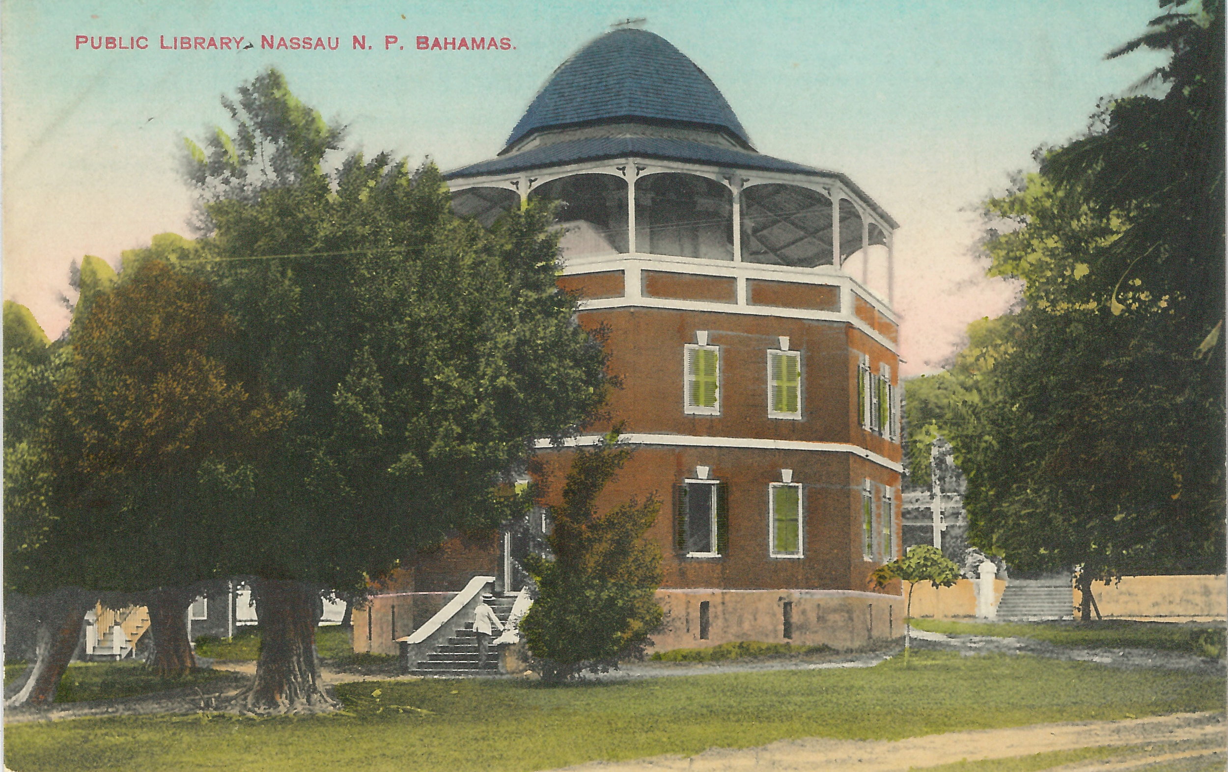 ‘Public Library’ (estimated c.1890-1930), handcoloured colonial-era postcard by James “Doc” Sands.