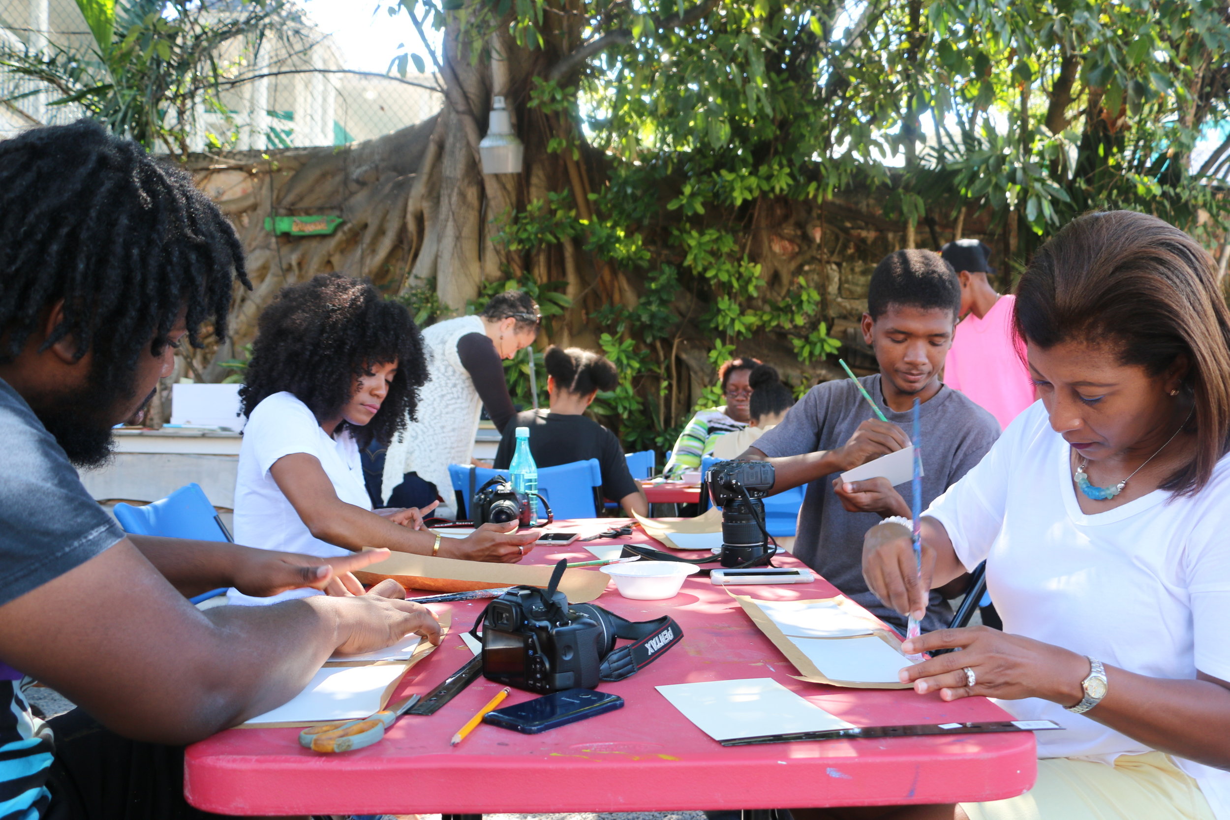 Group at Hillside House making portfolios for their photo collection.