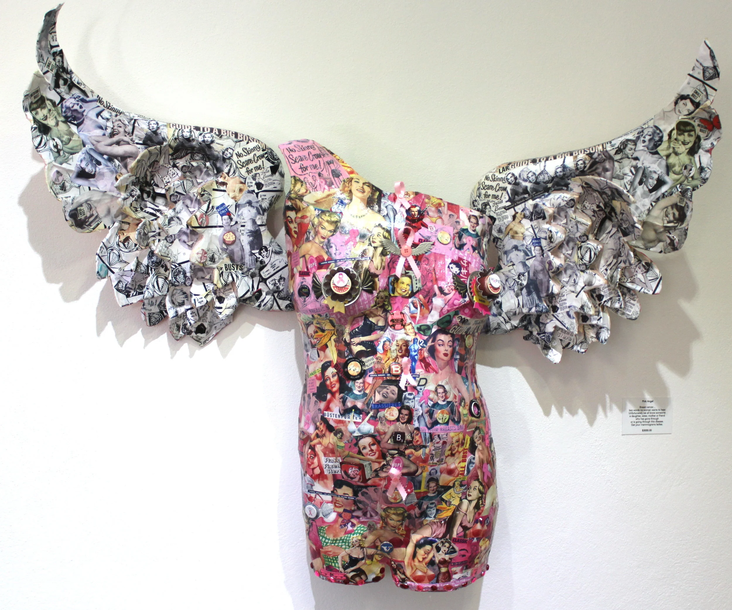 Sue Katz-Lightbourn, ‘Pink Angel’ (2016), paper mache wings, plaster cast, vintage ads, found objects, dimensions variable. 