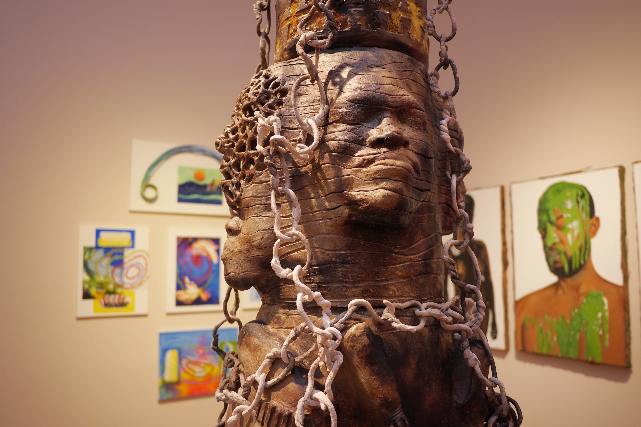 Close up of the towering clay sculpture ‘Equality?’ (2016) by Joann Behagg and Jackie Pinder.