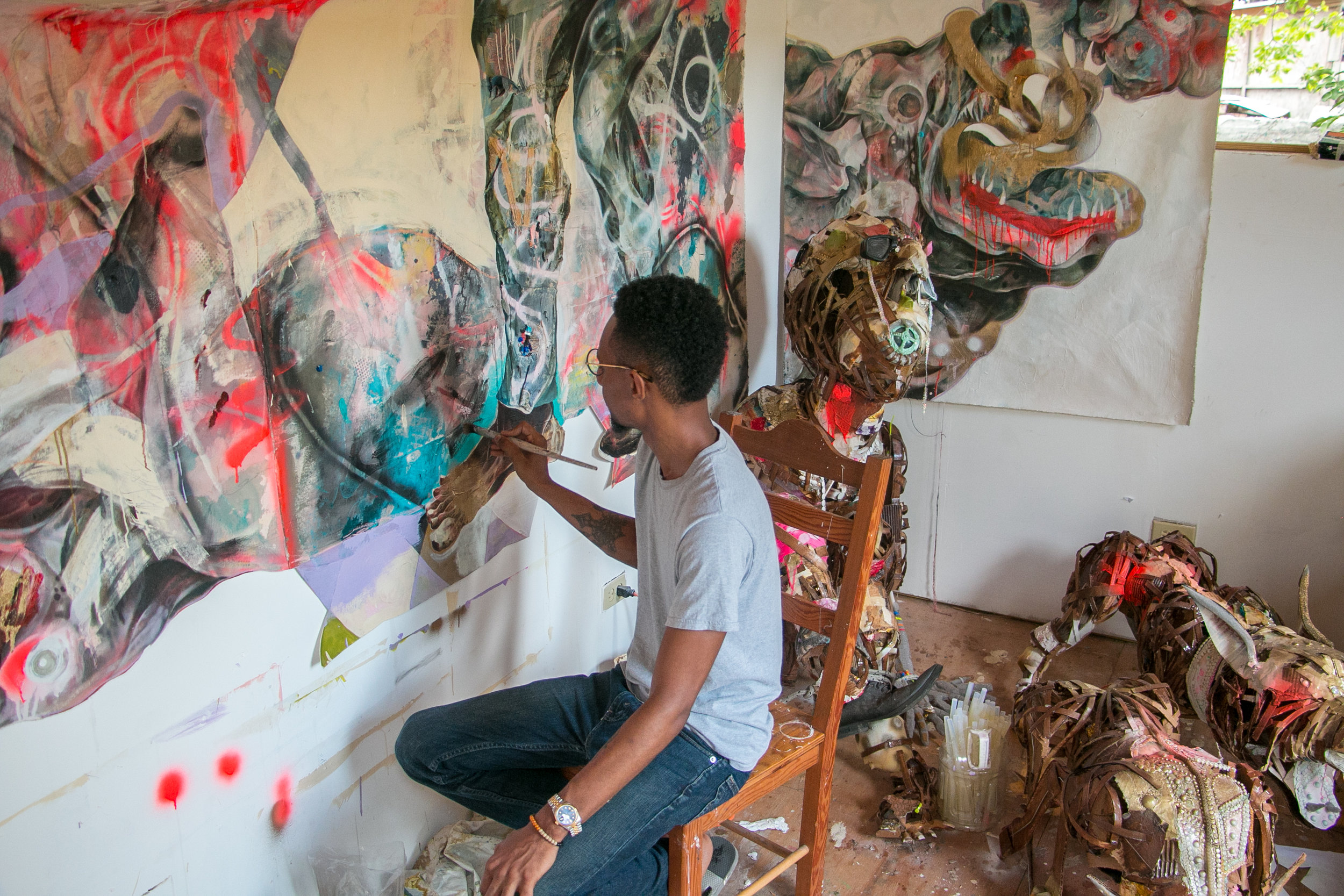 Lavar Munroe working in his studio on Milton Street, Nassau Bahamas. (Photo by Keisha Oliver)
