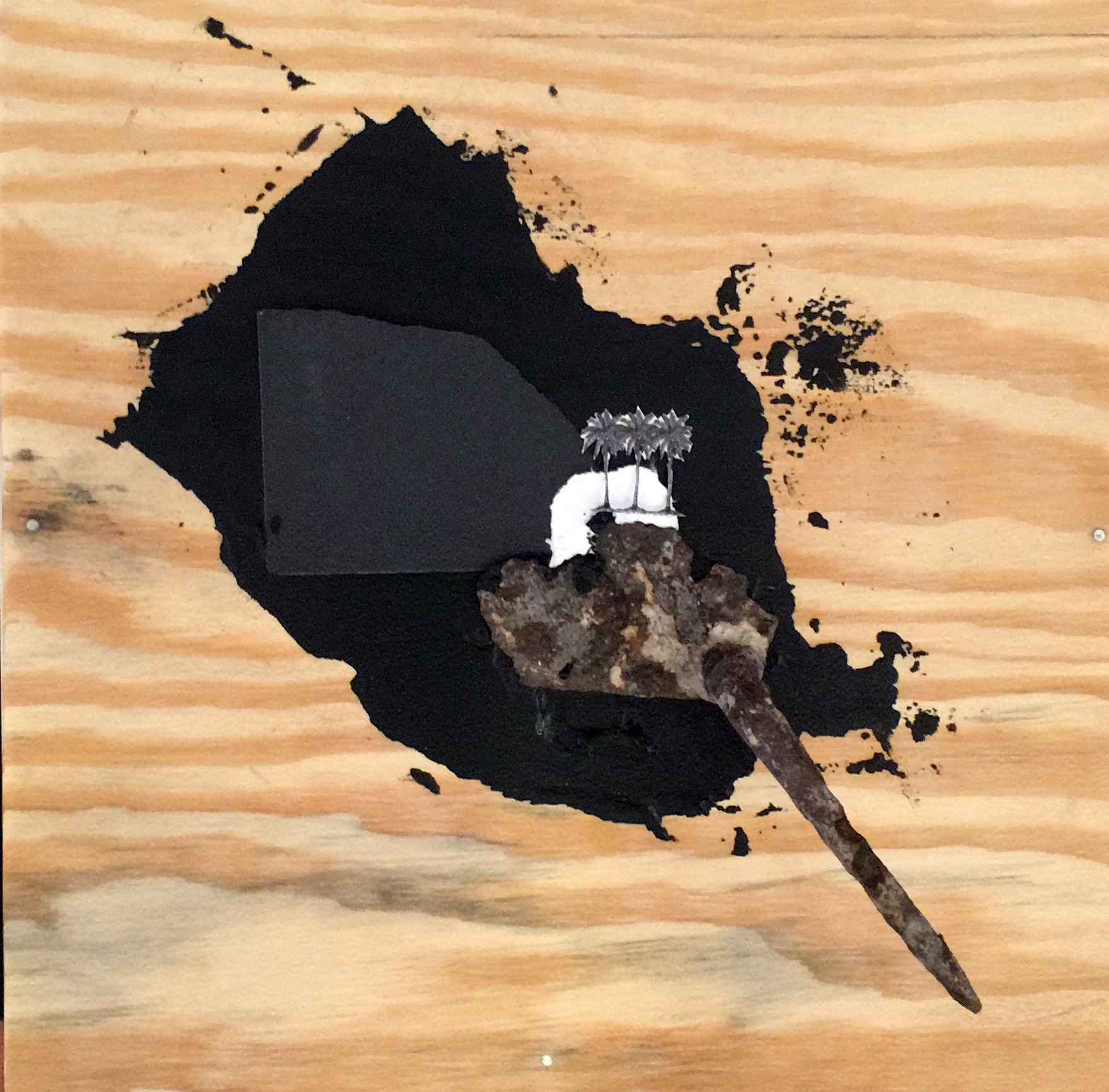 “Black Paradise” (2017), Jodi Minnis, found object and image with acrylic paint, 11” x 11”.