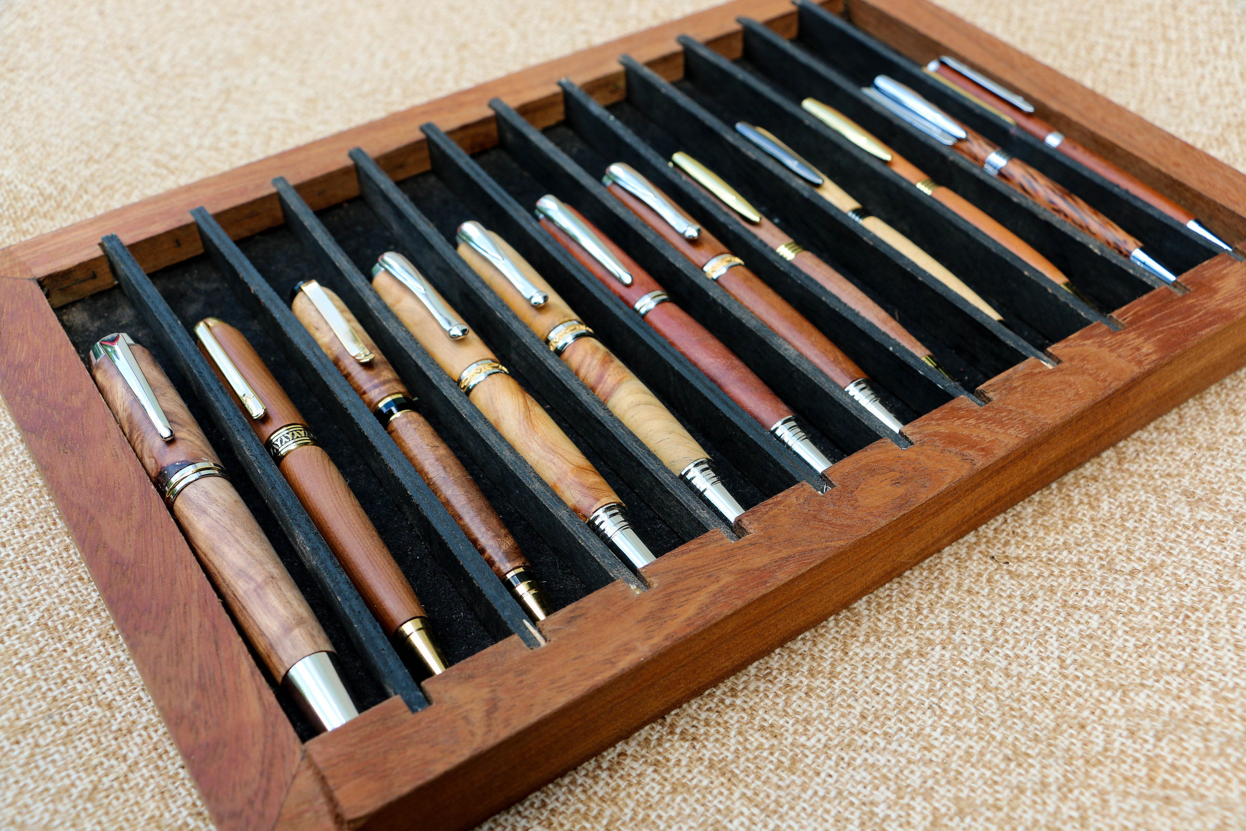 Collection of pens made from a variety of wood types by Robin Hardy, 2017 (Photo by Keisha Oliver)