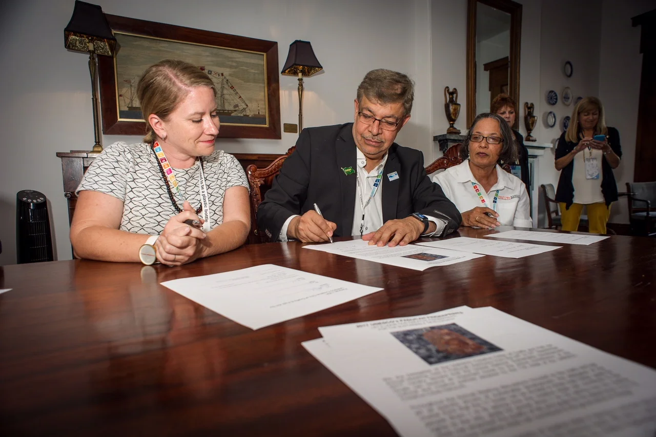 Official delegates of UCCN Crafts and Folk Art Cluster gather with the Paducah Mayor, Brandi Harless after signing the Paducah Declaration.