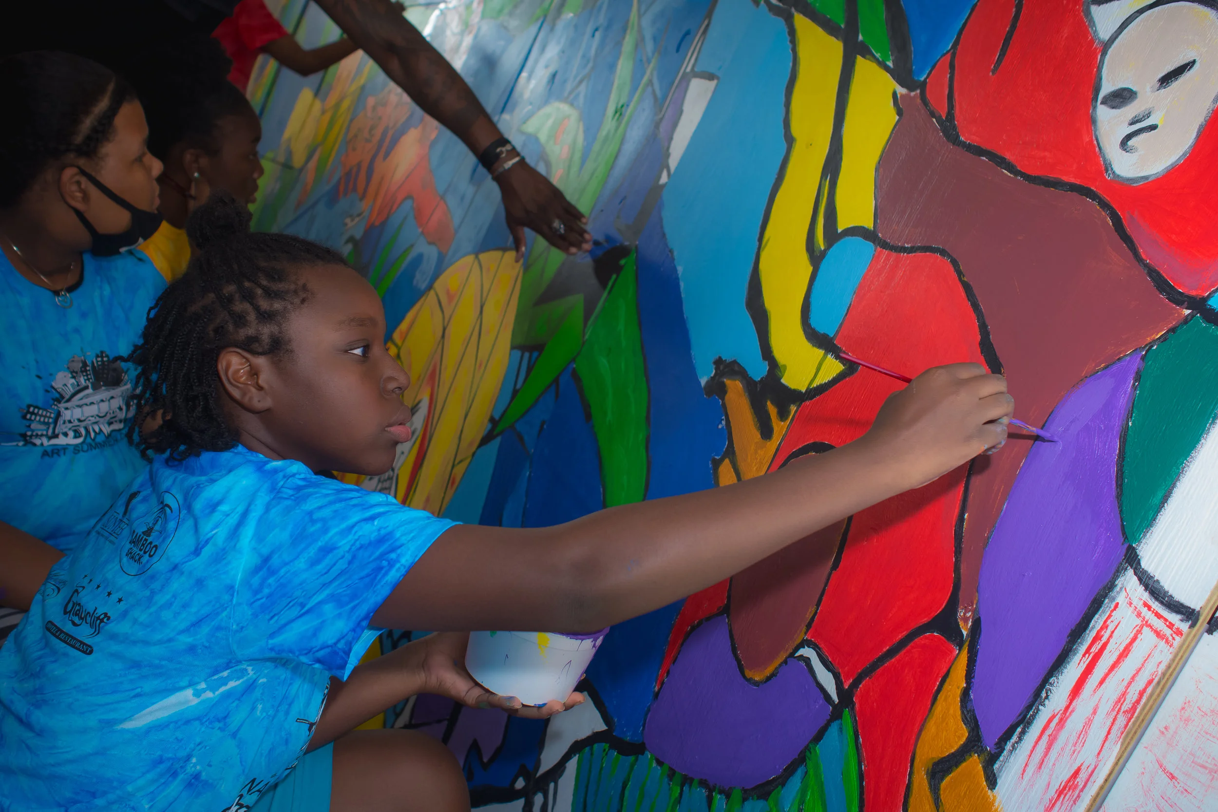 Preston Albury students working on the final touches of Eleuthera Mural