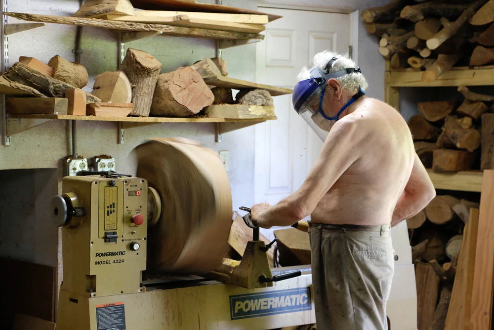 Robin Hardy turning a bowl in his workshop. Nassau, The Bahamas. (Photo by Keisha Oliver)