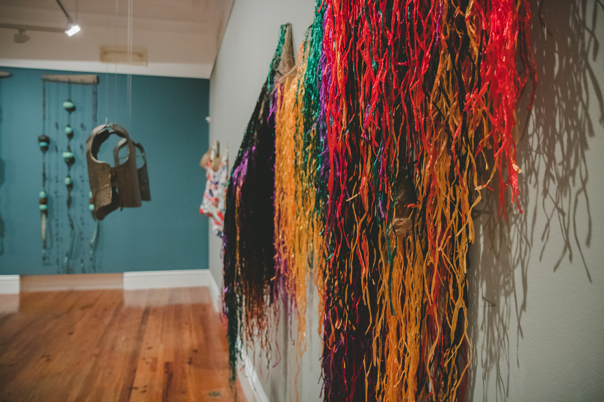 Elevating the Blue Light Special , (2018). Averia Wright. Mixed Media Installation. Bronze, Burlap, Raffia, & Various Textiles. Dimensions variable.