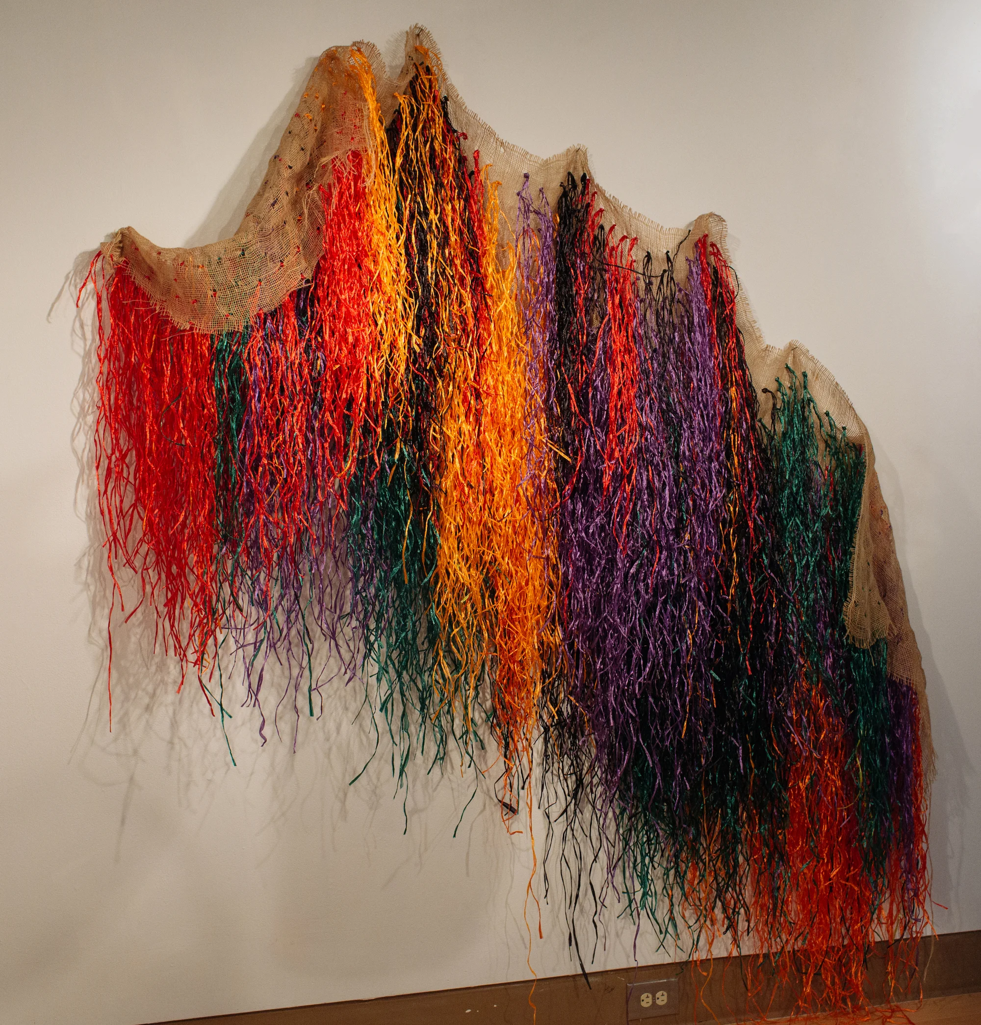Elevating the Blue Light Special , (2018). Averia Wright. Mixed Media Installation. Bronze, Burlap, Raffia, & Various Textiles. Dimensions variable.