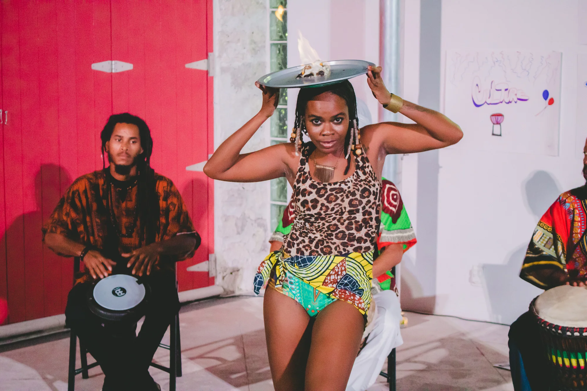 Princess Pratt, co-founder of Saucy Expressions performs with the drumming group, Ubuntu, which she is a part of. Image courtesy of Jackson Petit and the NAGB.