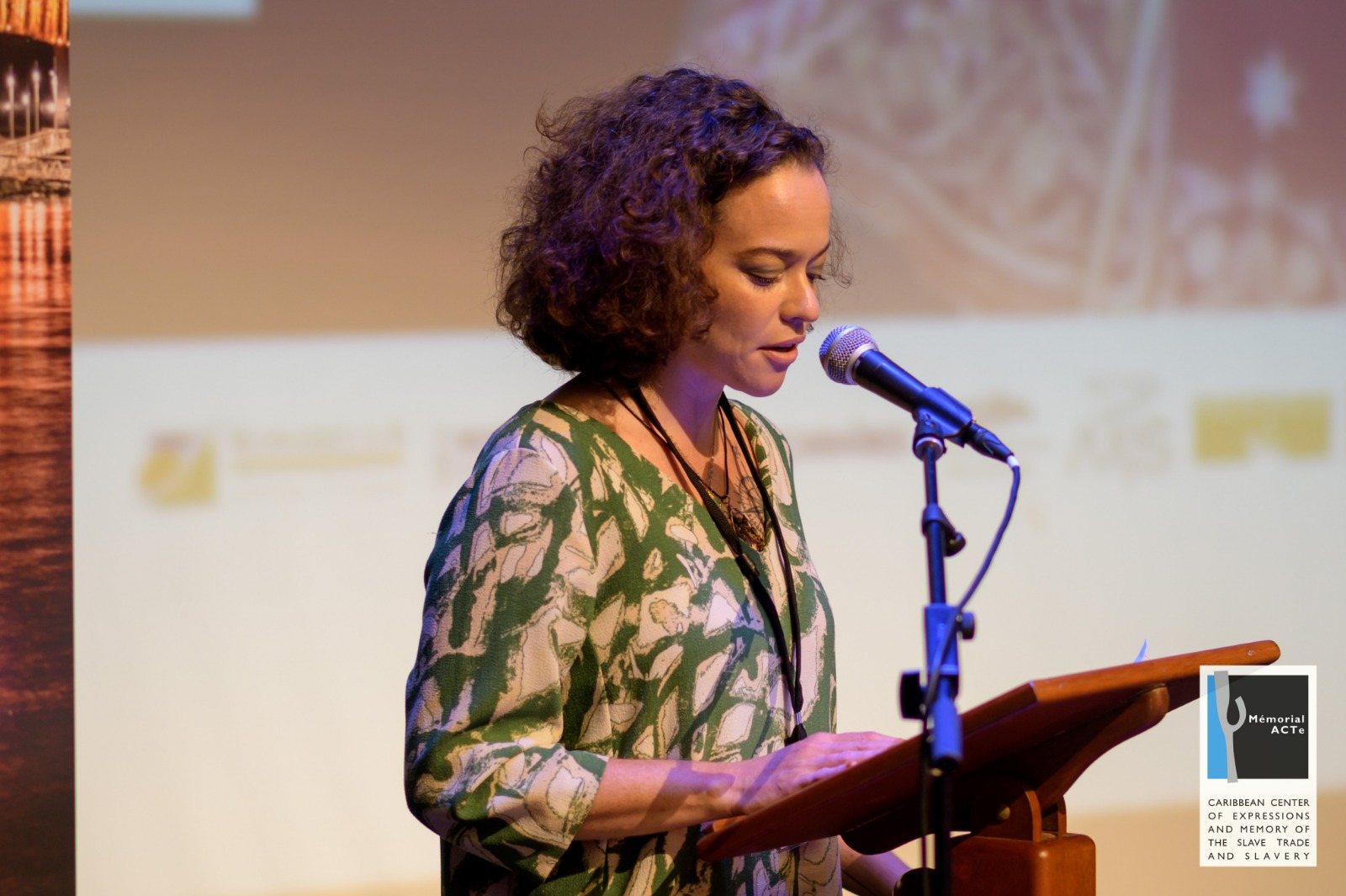 Chief Curator, Holly Bynoe, announcing the hosting of the next convening of Tilting Axis 6 which will be held in The Bahamas at the NAGB. Image courtesy Guillaume Aricique and Memorial ACTe