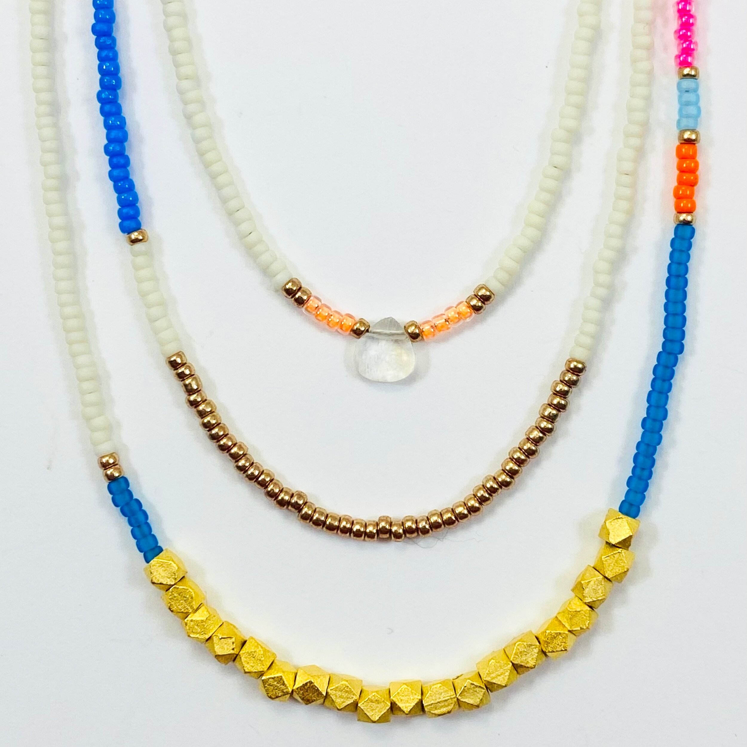 Design and color forward Layered Beaded Necklaces Made in Maine USA cream, asymmetric, moonstone gem stone, gold jewelry