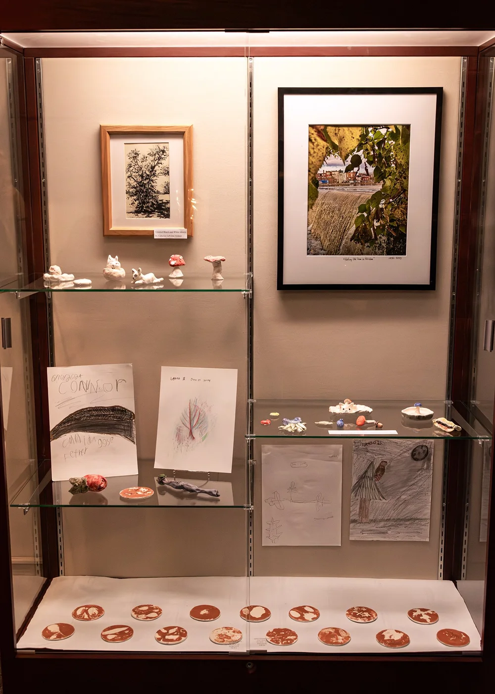 New display cases with assorted works of art
