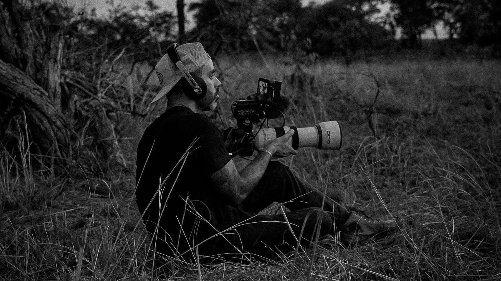 David Guersan shooting in the wilderness, in Zambia