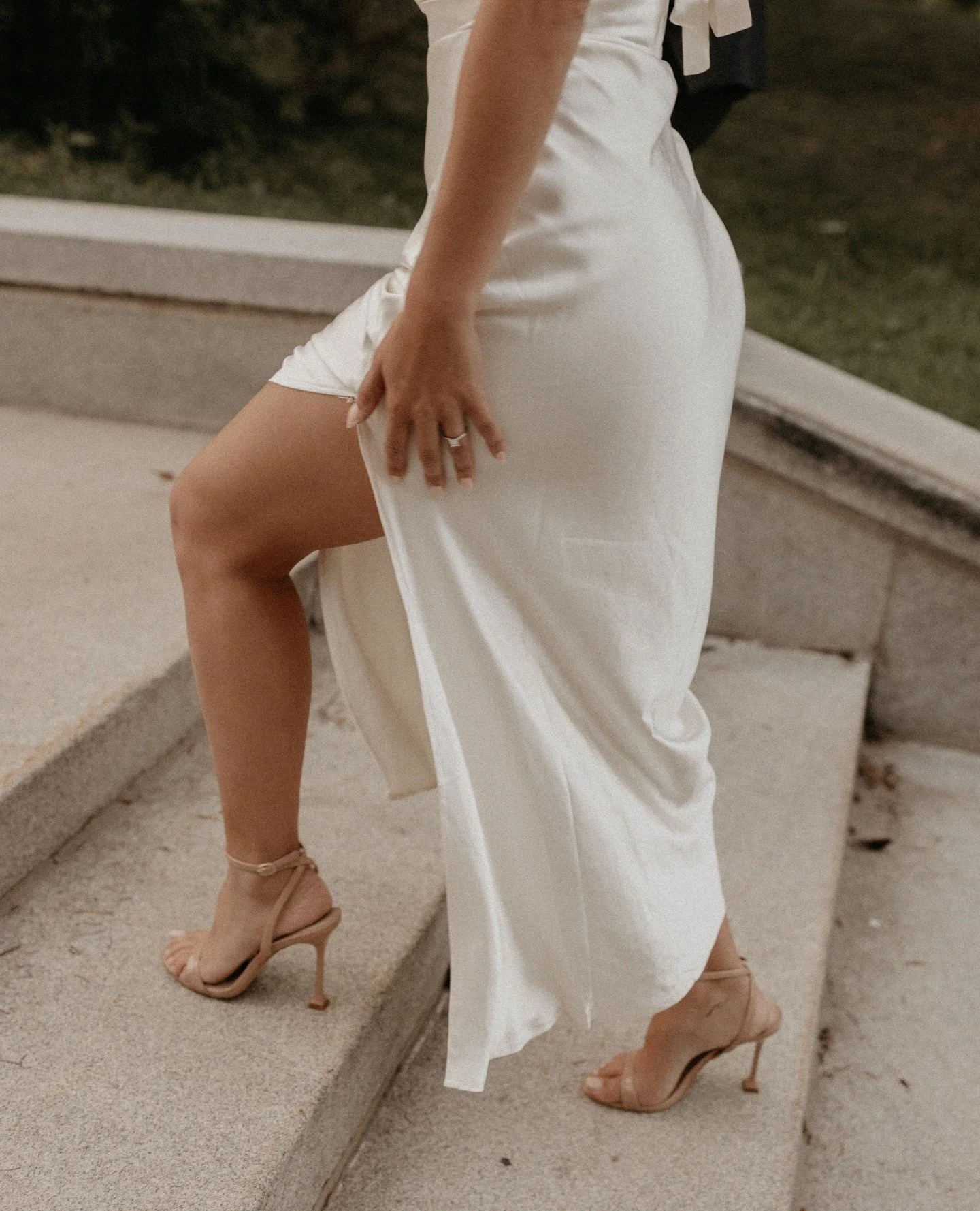 Sometimes the dress and the legs deserves there own spotlight.⁠
The movement, the lines, the way it catches the light as you walk.⁠
Praying for nicer weather soon. ⁠
#bridalstyle #weddingdress #seventharrowstudio #buffaloweddingphotographer #weddingd