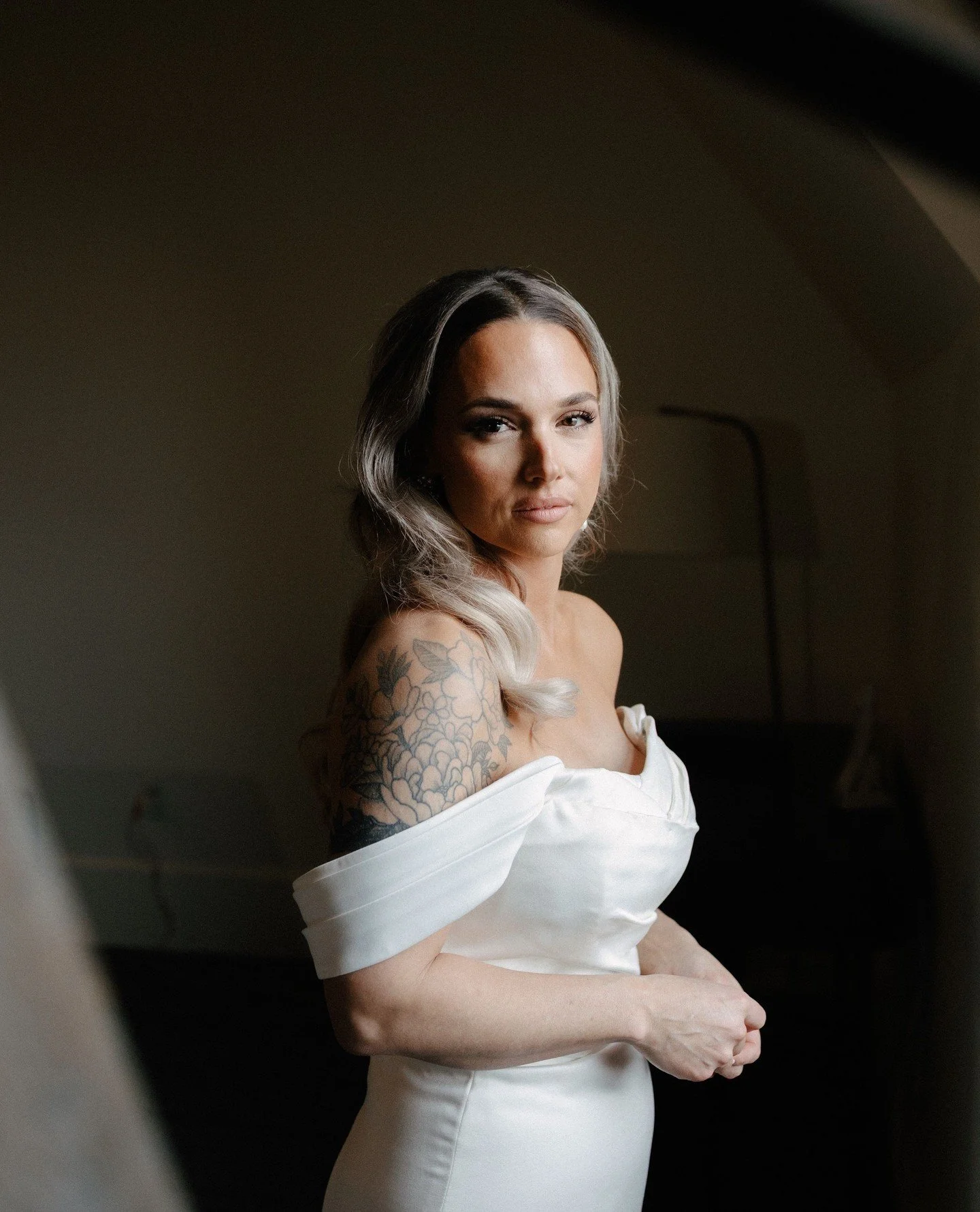 ⁠
She took one quiet breath right before walking out that door and I caught it. That is the whole job. The in between, the still, the moment before everything begins. I live for this part more than almost anything else.⁠
#buffalobride #bridalportrait
