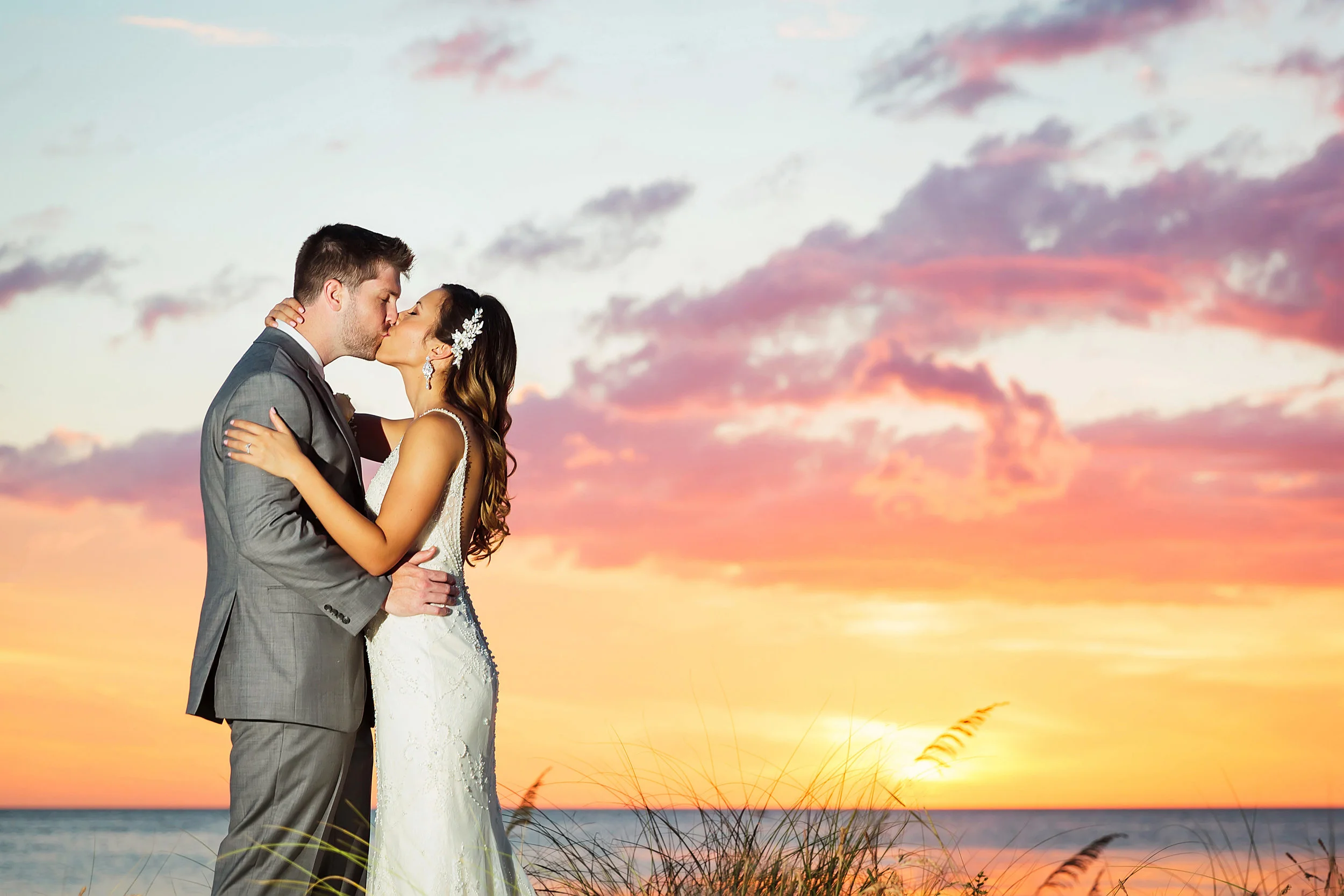 hyatt clearwater beach, sunset, romance, kiss, ocean, beach, wedding photography, limelight photography