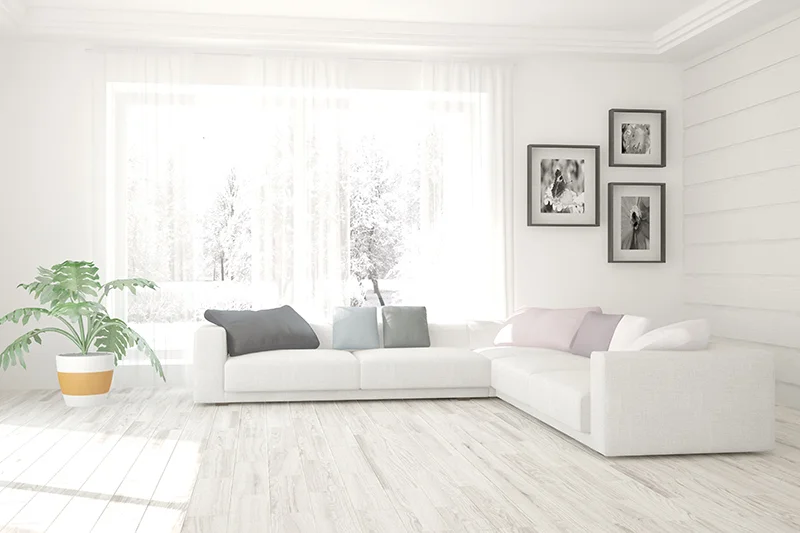 Don’t leave rooms empty when you stage your house. An attractive seating area can help potential buyers imagine the home as their own. Photo from Shutterstock.