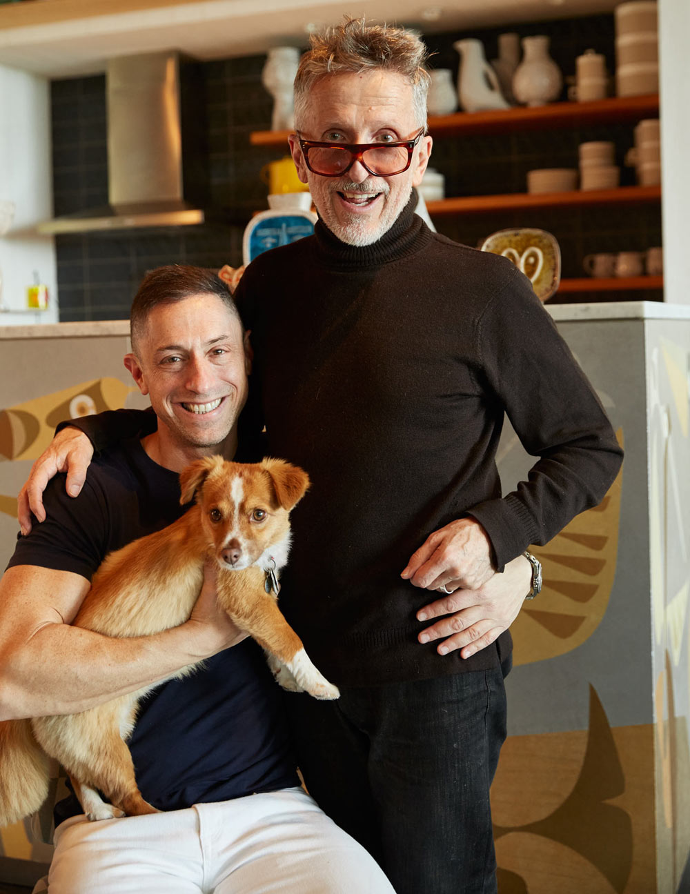 Jonathan and his partner, Simon Doonan, and their dog FoxyLady.