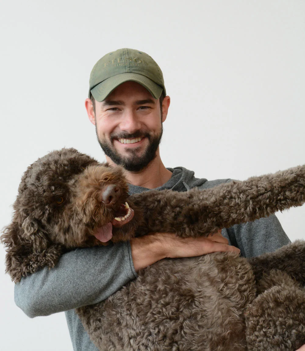 Seth Grizzle with his dog, Fig