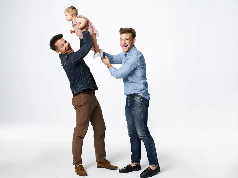 Nate with daughter Poppy and husband Jeremiah Brent