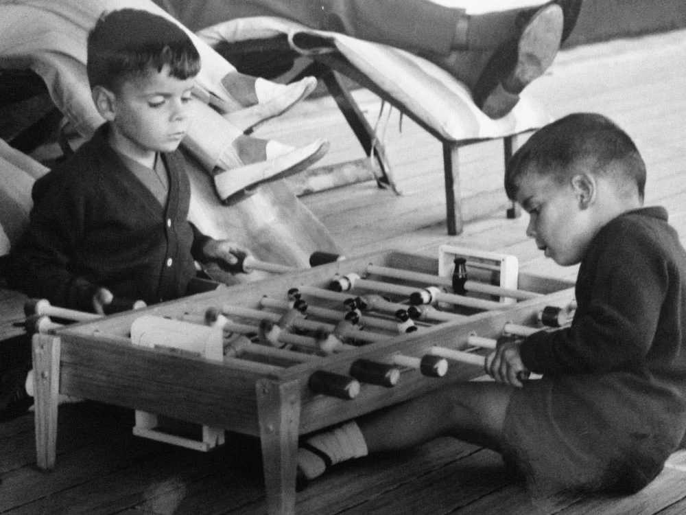 Pictured with his brother in a friendly game of foosball