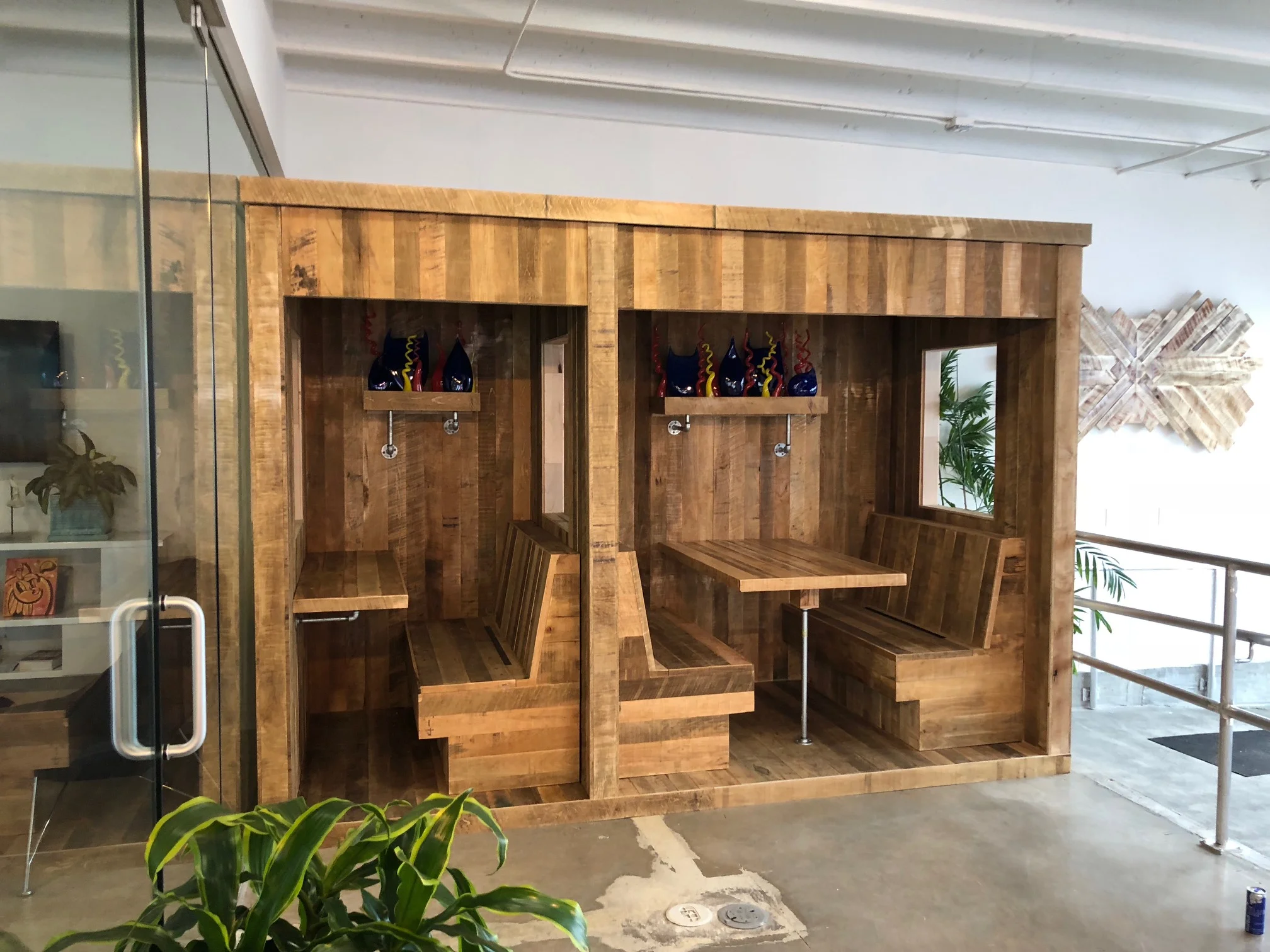 Red Bull Miami office privacy booths and acoustic wood panel decor