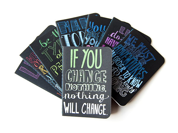 Hand-lettered covers of pocket journals