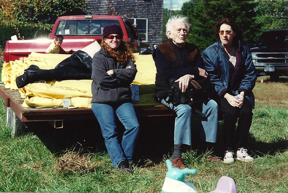 Fall, 2000 | Ricky with Alice and Carol | Ricky, Alice and Carol find a comfortable seat on a flatbed.