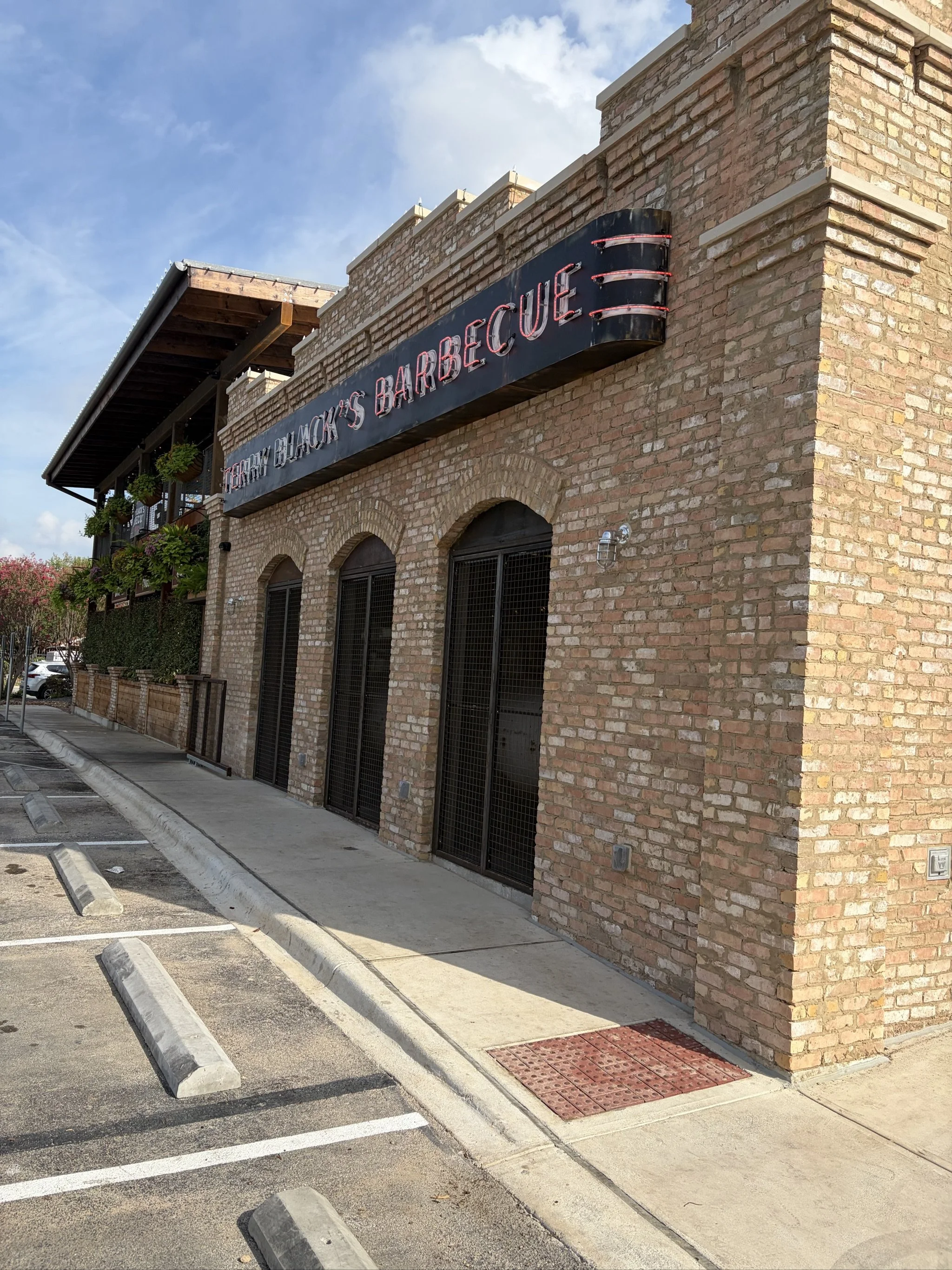 Old Texas Brick arches and cast stone cap, Terry Black's New Braunfels