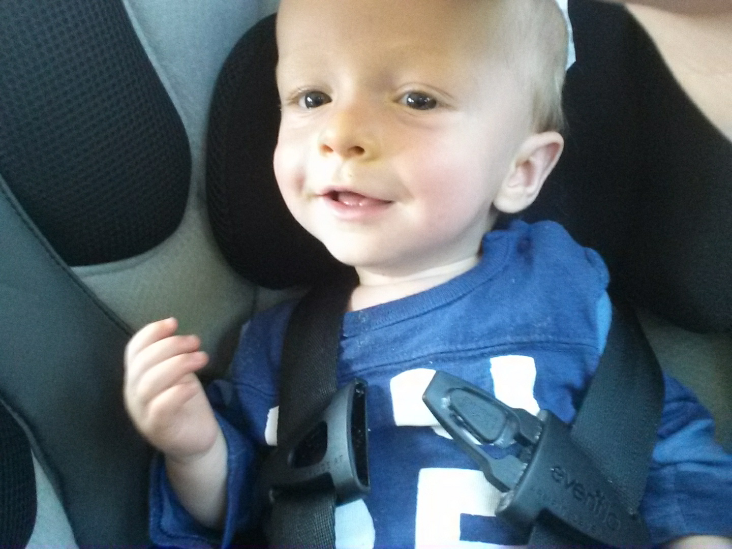 Reagan being a ham after he learned how to unclip his carseat strap