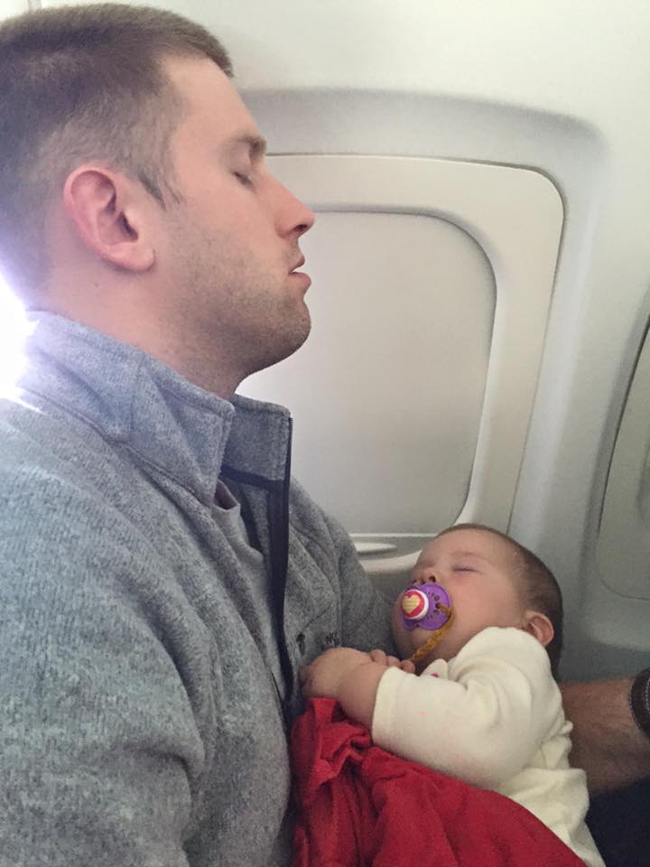 My husband and daughter both asleep on a "to EARLY" flight