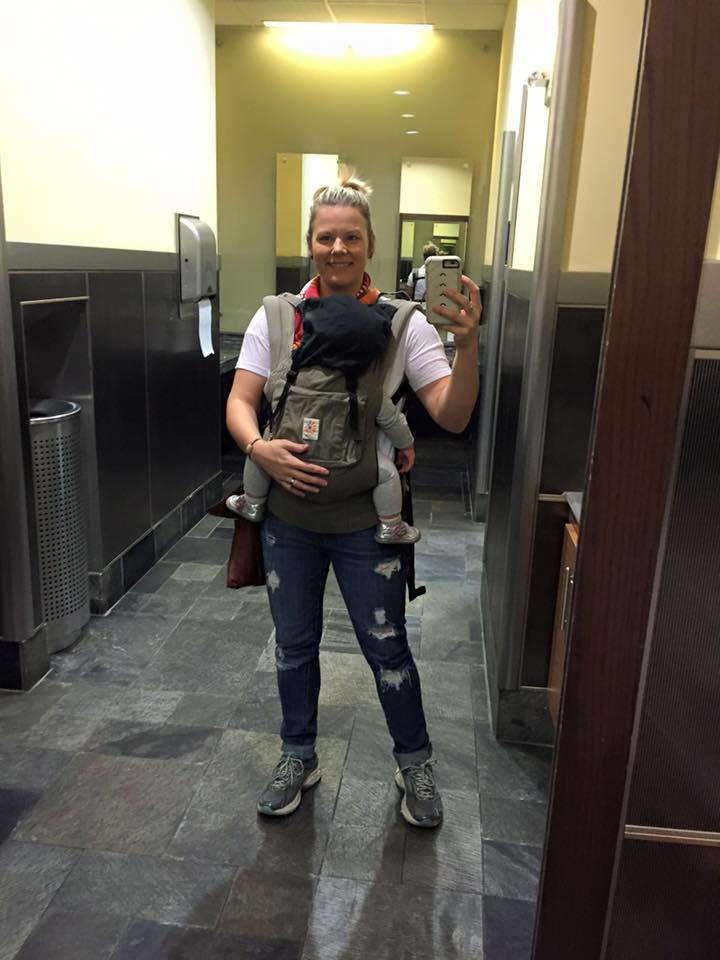 This is me and my daughter during a bathroom break on a layover. We were flying solo to Virginia from Florida.