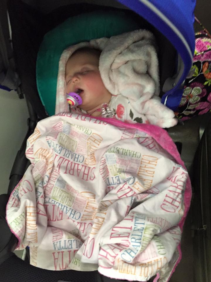 Sleeping in her Stroller on a train ride from Venice to Florence