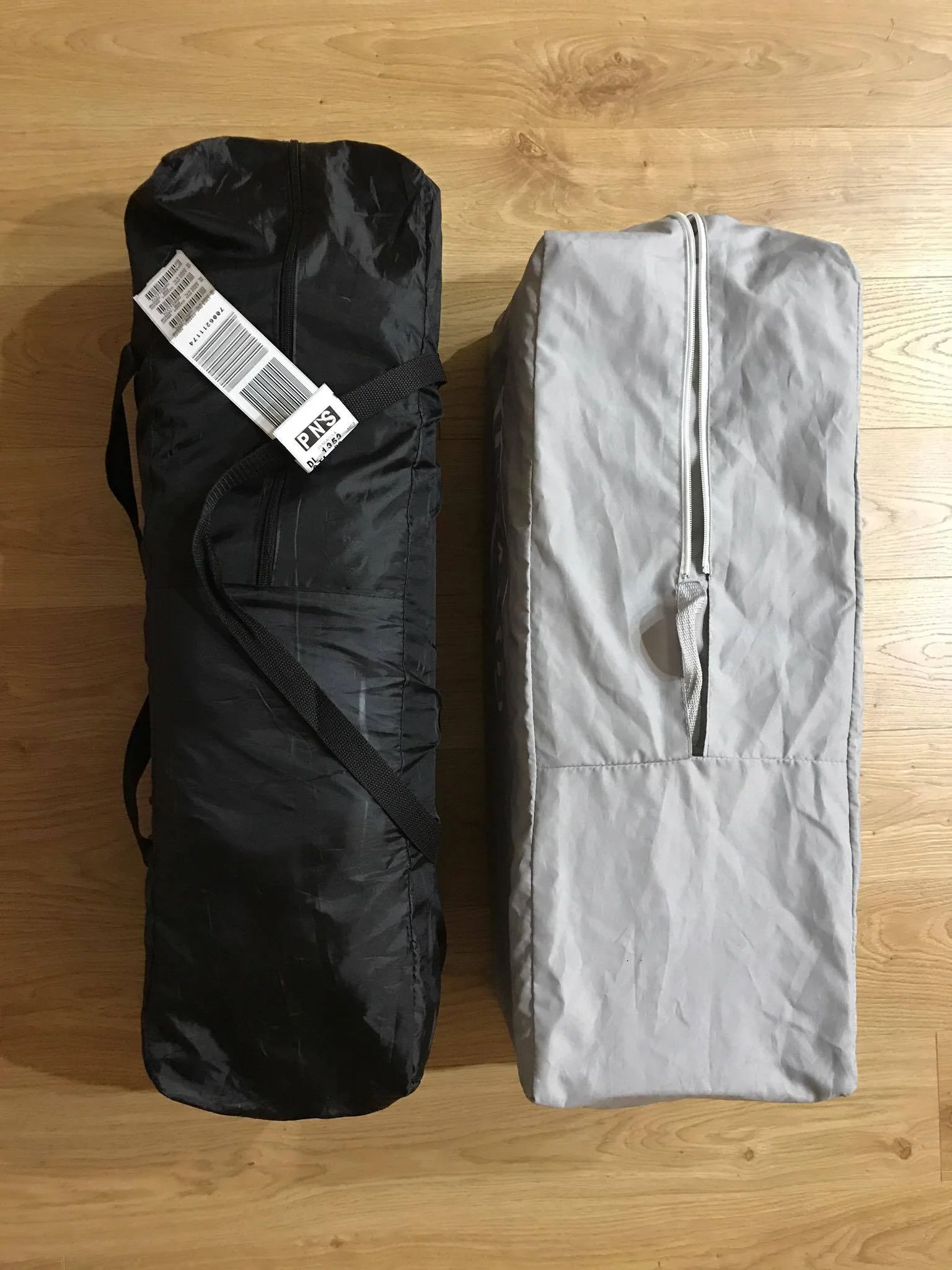 Here you can see the beds are pretty much the same size when packed into their travel bags(extended on Left, Standard on Right)