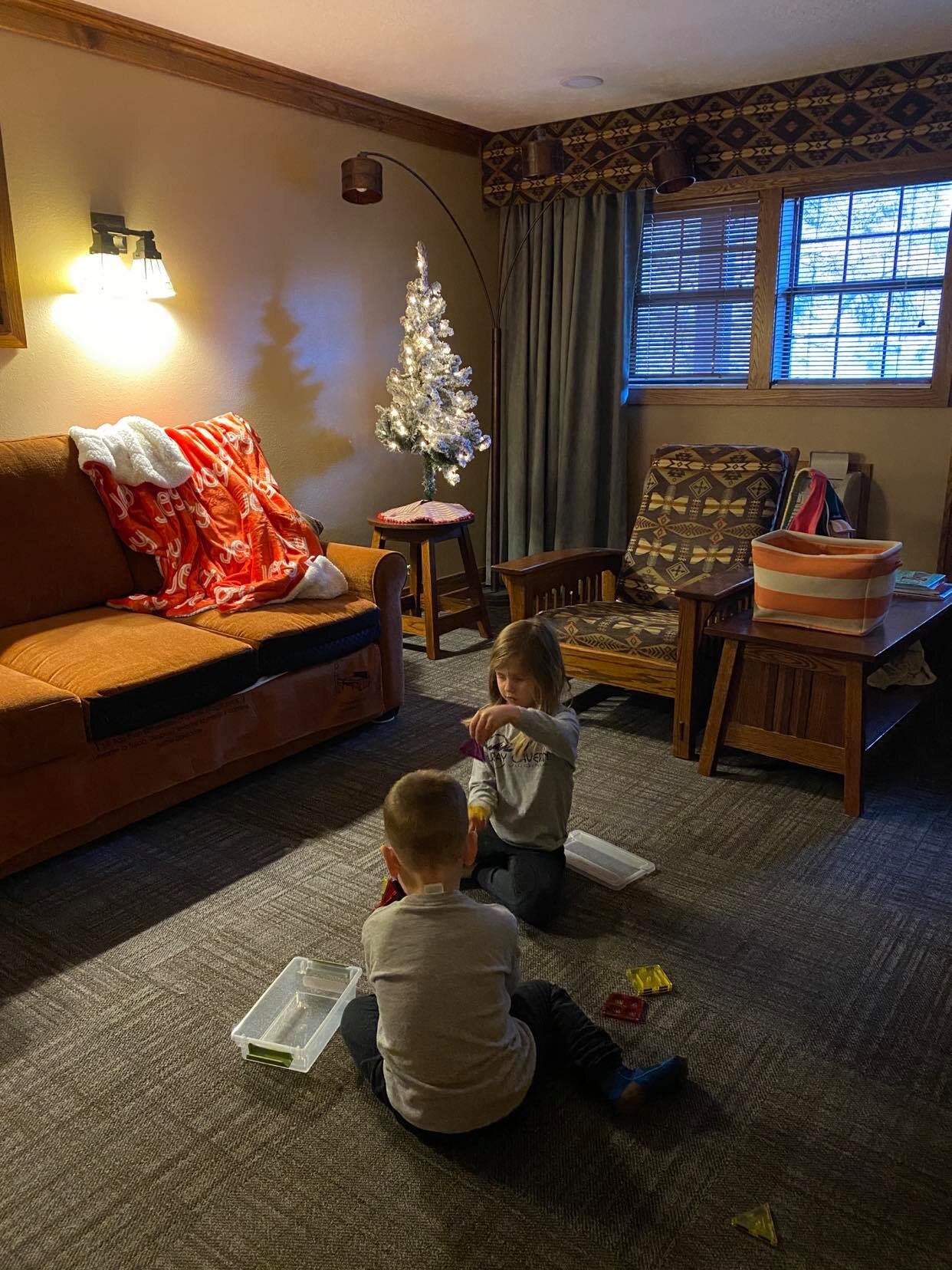 This is the kids playing in the living room of our king suite.  we brought our own christmas tree to make it feel christmasy since it was the week before christmas