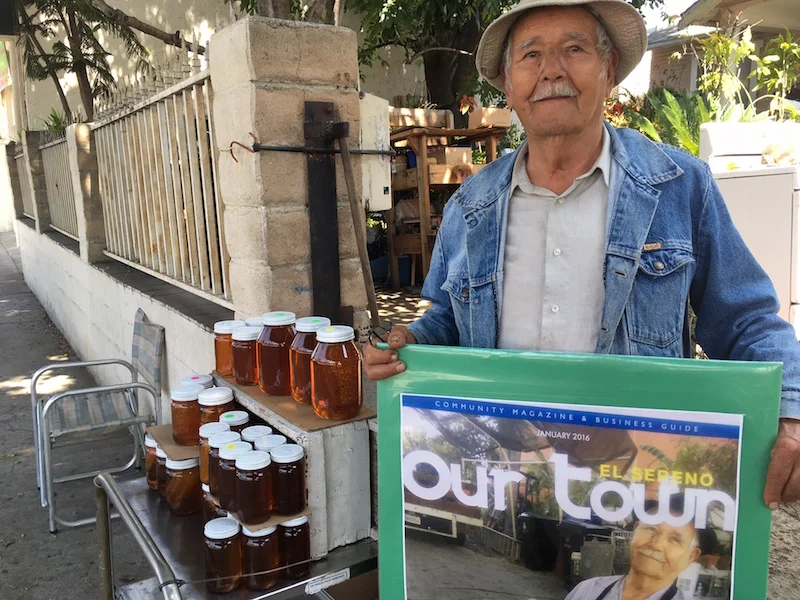 Victor Jaramillo at his honey stand next door to the El Sereno Library. 