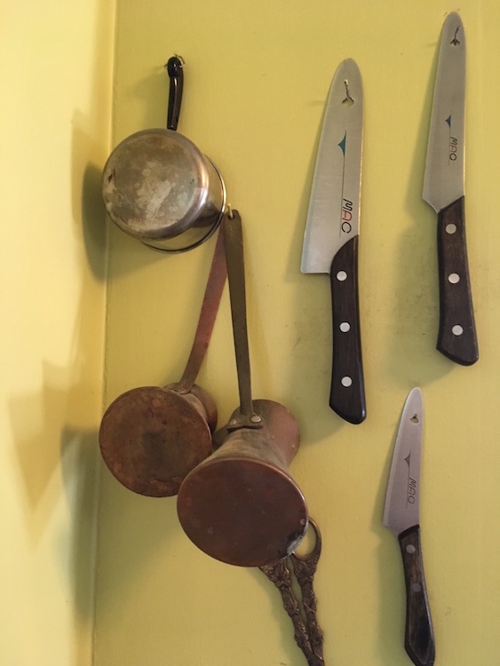 Neighbor Elizabeth Barber's wall of essentials. I love the pattern of the objects against the wall. 