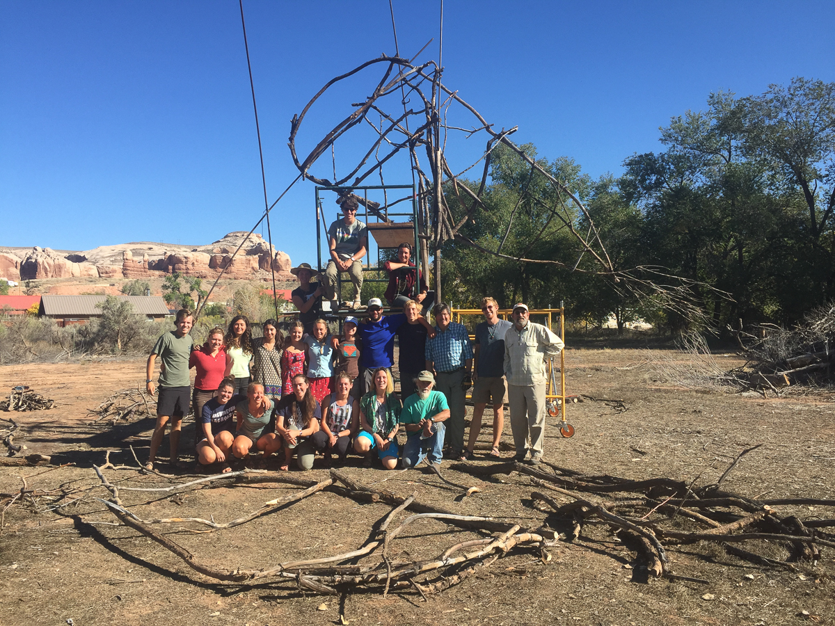 Westies help out Joe Pachak build the Bluff solstice bonfire