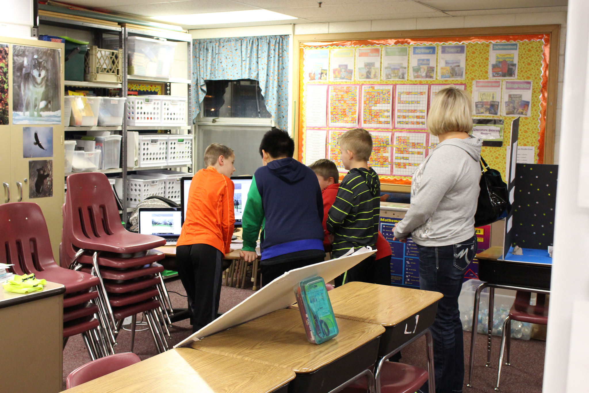Zachary presenting his project to a group of students. 