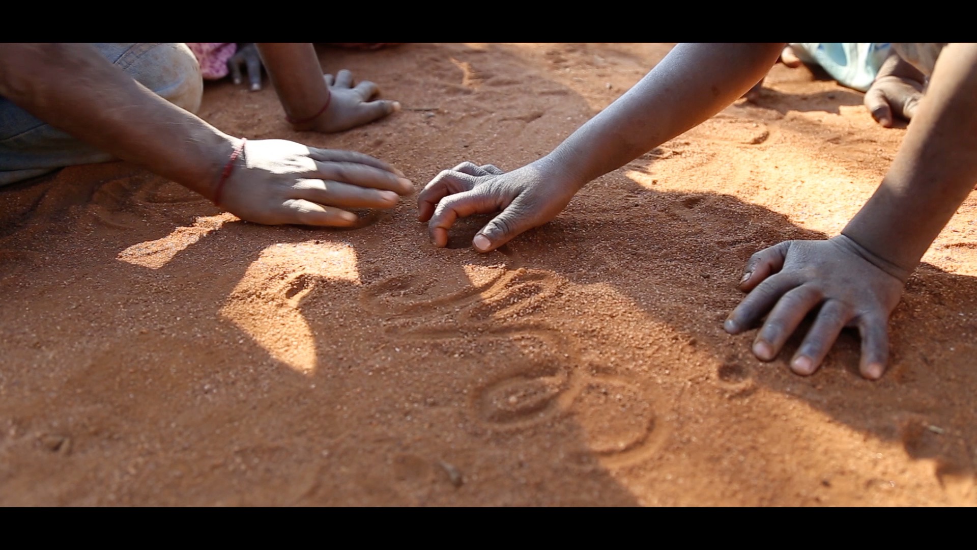 kids in sand.jpg