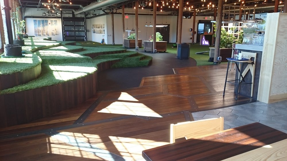 This restaurant in America includes the outside inside. The restaurant is surrounded by snow in winter, so what a great place to take the family in winter. This feels like you are in the garden with the synthetic grass. This child friendly space gives a great indoor space in winter. Synthetic grass is great for creating a green play area inside or out.(works by others)