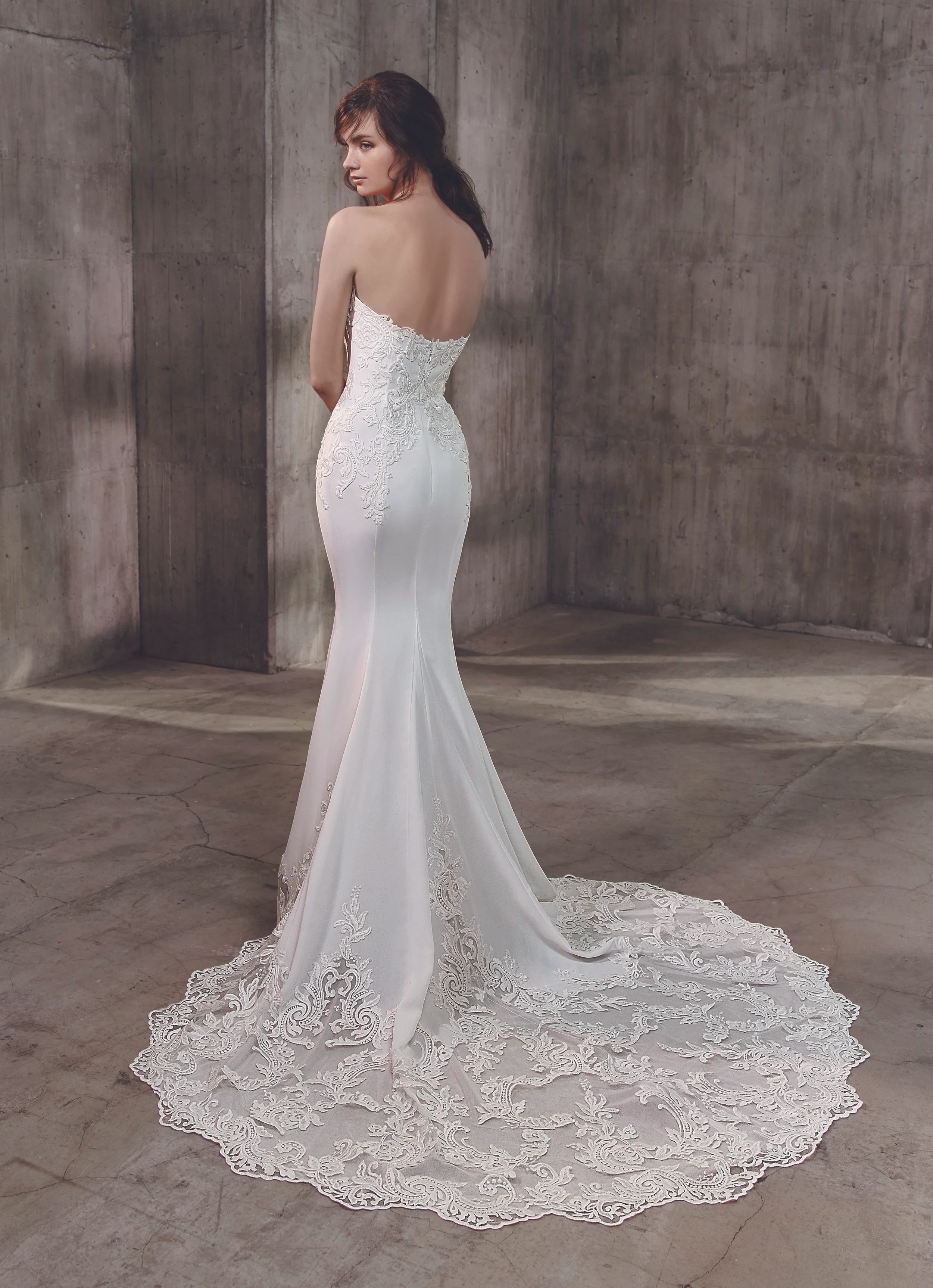 The exquisite detailing from the plunging strapless sweetheart neckline down to the jaw-droppingly beautiful hem and train ensures all eyes will be on you coming and going. 